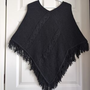 Black cable knit fringed poncho